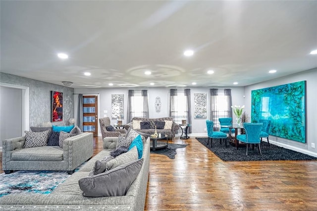 living room with recessed lighting, wood finished floors, and baseboards