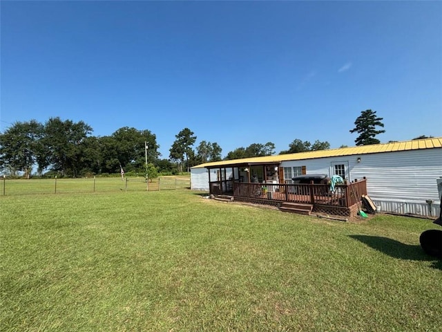 view of yard with a wooden deck