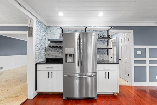 1647 Grandeus Ln SW, Stone Mountain, GA 30087 - kitchen featuring stainless steel fridge, decorative backsplash, white cabinetry, dark countertops, and recessed lighting