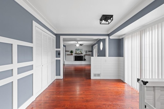 1647 Grandeus Ln SW, Stone Mountain, GA 30087 - corridor with wood finished floors, a wainscoted wall, and ornamental molding