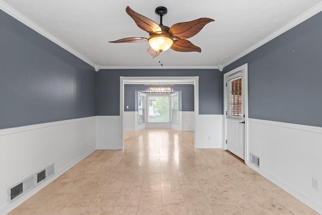 1647 Grandeus Ln SW, Stone Mountain, GA 30087 - hallway featuring a chandelier, ornamental molding, and a wainscoted wall