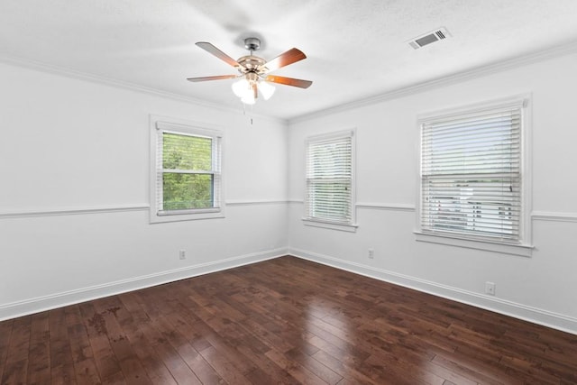 1647 Grandeus Ln SW, Stone Mountain, GA 30087 - empty room featuring a ceiling fan, wood-type flooring, baseboards, and crown molding