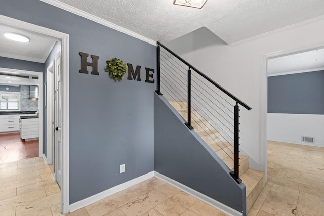1647 Grandeus Ln SW, Stone Mountain, GA 30087 - stairway featuring crown molding, a textured ceiling, and baseboards