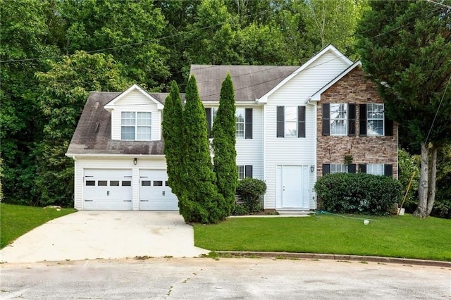 colonial inspired home with concrete driveway, stone siding, and a front yard