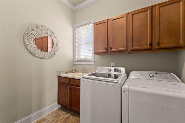4729 Deer Creek Ct, Flowery Branch, GA 30542 - clothes washing area with washer and dryer, cabinet space, crown molding, baseboards, and light tile patterned floors