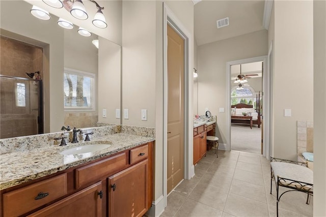 4729 Deer Creek Ct, Flowery Branch, GA 30542 - full bathroom featuring healthy amount of natural light, tile patterned flooring, vanity, and ceiling fan