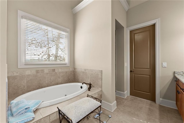 4729 Deer Creek Ct, Flowery Branch, GA 30542 - bathroom with vanity, ornamental molding, a garden tub, baseboards, and tile patterned flooring