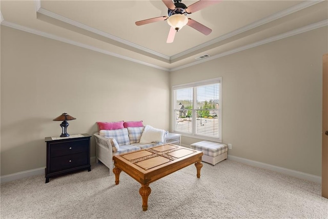 4729 Deer Creek Ct, Flowery Branch, GA 30542 - living room featuring a tray ceiling, crown molding, ceiling fan, light colored carpet, and baseboards