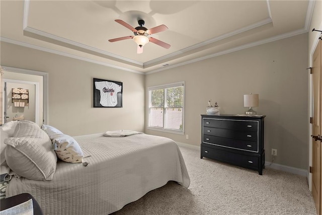 4729 Deer Creek Ct, Flowery Branch, GA 30542 - bedroom featuring a raised ceiling, crown molding, light colored carpet, a ceiling fan, and baseboards