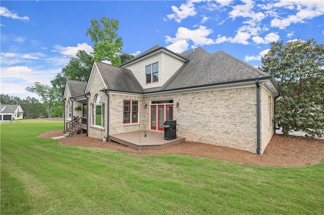 4729 Deer Creek Ct, Flowery Branch, GA 30542 - back of property with a yard, brick siding, a chimney, a patio, and roof with shingles