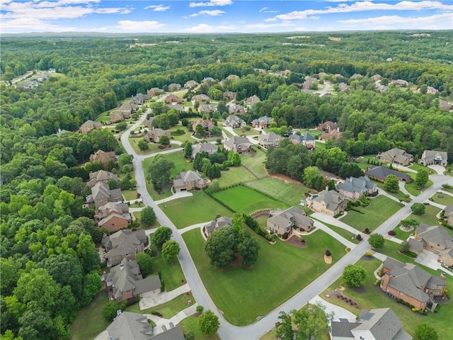 4729 Deer Creek Ct, Flowery Branch, GA 30542 - aerial overview of property's location with a heavily wooded area and nearby suburban area