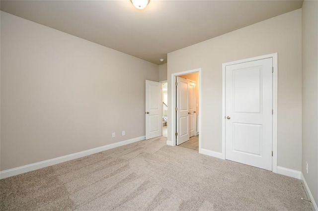 8245 Dawson View Way, Cumming, GA 30028 - unfurnished bedroom featuring light colored carpet and baseboards