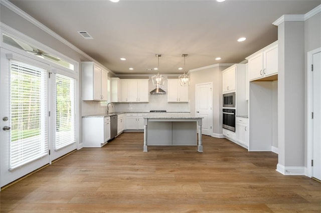 8245 Dawson View Way, Cumming, GA 30028 - kitchen featuring appliances with stainless steel finishes, ornamental molding, wall chimney range hood, a sink, and recessed lighting