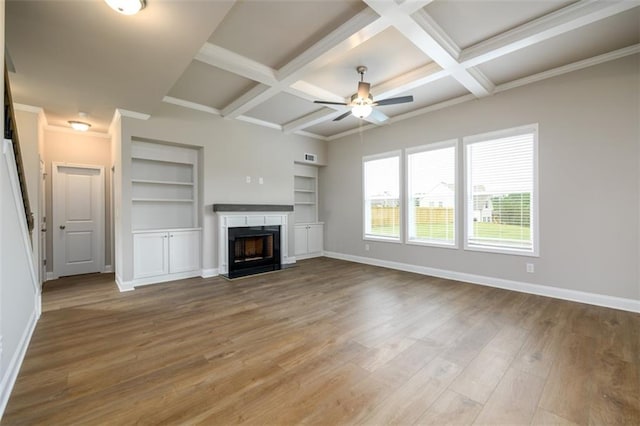 8245 Dawson View Way, Cumming, GA 30028 - unfurnished living room with ceiling fan, wood finished floors, coffered ceiling, baseboards, and beam ceiling