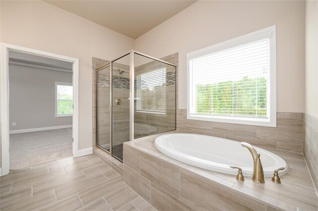 8245 Dawson View Way, Cumming, GA 30028 - full bathroom featuring a bath, a stall shower, and baseboards