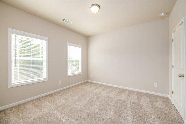 8245 Dawson View Way, Cumming, GA 30028 - empty room featuring light colored carpet, baseboards, and a smoke detector