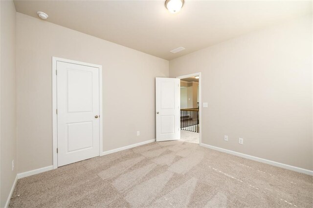 8245 Dawson View Way, Cumming, GA 30028 - unfurnished bedroom with carpet flooring and baseboards