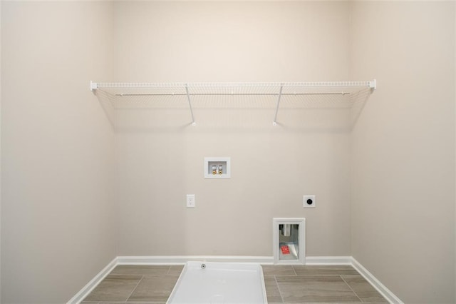 8245 Dawson View Way, Cumming, GA 30028 - laundry room featuring hookup for an electric dryer, washer hookup, baseboards, and gas dryer hookup