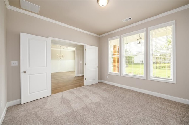 8245 Dawson View Way, Cumming, GA 30028 - unfurnished room with carpet, crown molding, a chandelier, and baseboards