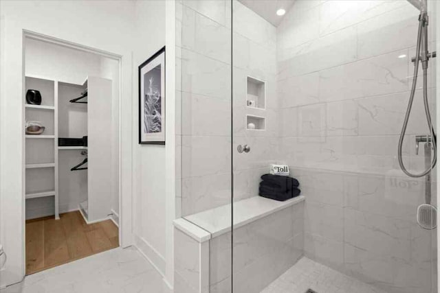 230 New St Unit 2201-4, Decatur, GA 30030 - full bathroom featuring tiled shower and a walk in closet