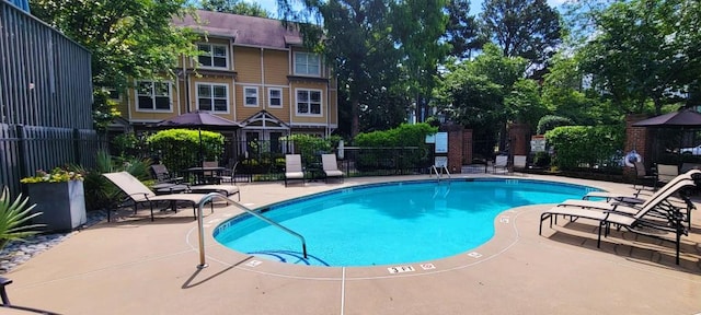 380 Grant Cir SE Unit 110, Atlanta, GA 30315 - community pool featuring a patio