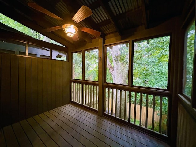 380 Grant Cir SE Unit 110, Atlanta, GA 30315 - unfurnished sunroom featuring wood walls, vaulted ceiling, hardwood / wood-style flooring, and a wooden deck