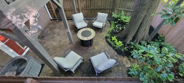 380 Grant Cir SE Unit 110, Atlanta, GA 30315 - fenced backyard with a patio area and ac unit