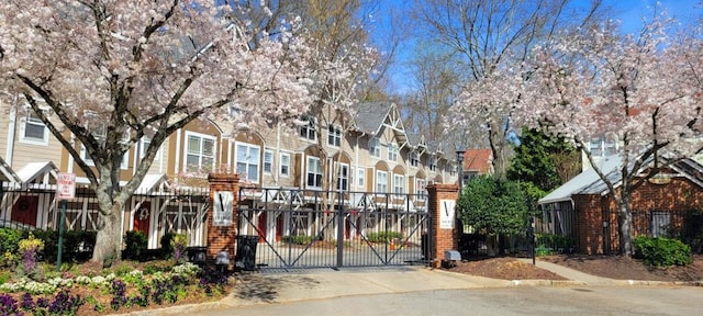 380 Grant Cir SE Unit 110, Atlanta, GA 30315 - view of building exterior featuring a residential view and driveway