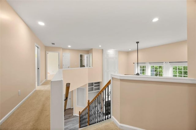 5156 Amberden Hall Dr, Suwanee, GA 30024 - hallway with an upstairs landing, baseboards, recessed lighting, and carpet flooring