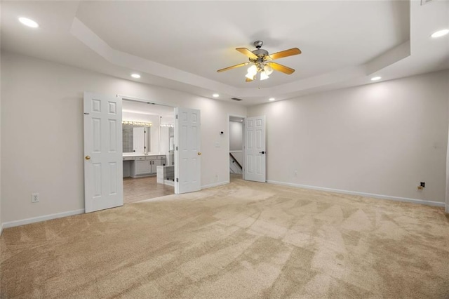 5156 Amberden Hall Dr, Suwanee, GA 30024 - unfurnished bedroom with recessed lighting, a raised ceiling, light colored carpet, baseboards, and ensuite bath