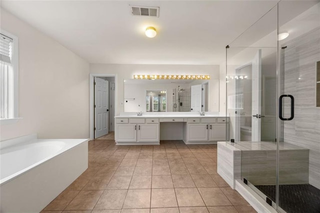 5156 Amberden Hall Dr, Suwanee, GA 30024 - full bathroom with double vanity, a shower stall, a bath, and tile patterned floors