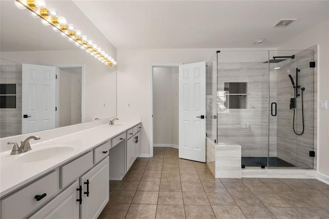 5156 Amberden Hall Dr, Suwanee, GA 30024 - bathroom with double vanity, a stall shower, tile patterned floors, and baseboards