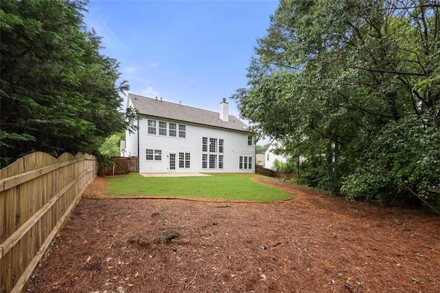 5156 Amberden Hall Dr, Suwanee, GA 30024 - back of house featuring a chimney, a patio, and french doors