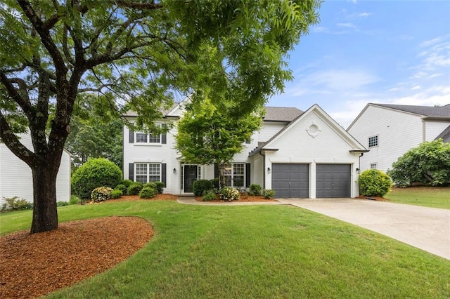 5156 Amberden Hall Dr, Suwanee, GA 30024 - view of front of property with a garage, a front yard, and concrete driveway