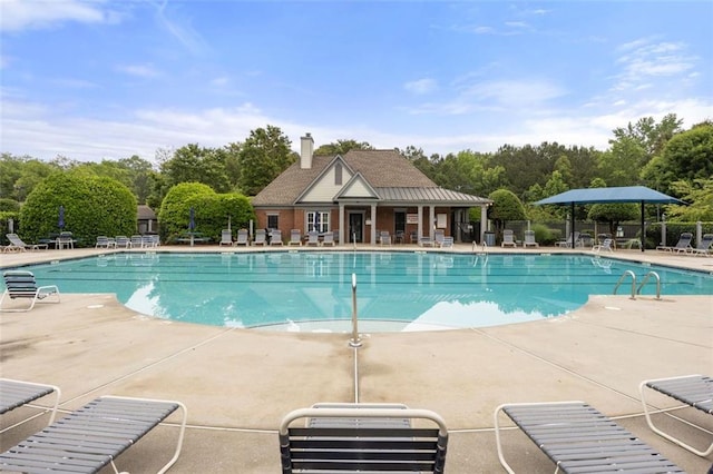 5156 Amberden Hall Dr, Suwanee, GA 30024 - community pool featuring a patio area and view of wooded area