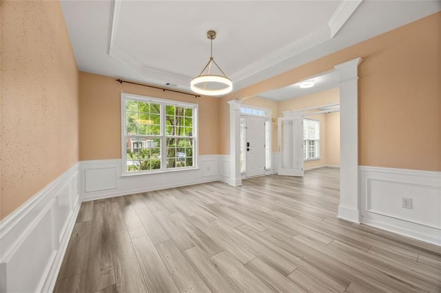 5156 Amberden Hall Dr, Suwanee, GA 30024 - unfurnished dining area with a wainscoted wall, healthy amount of natural light, ornamental molding, light wood finished floors, and a decorative wall
