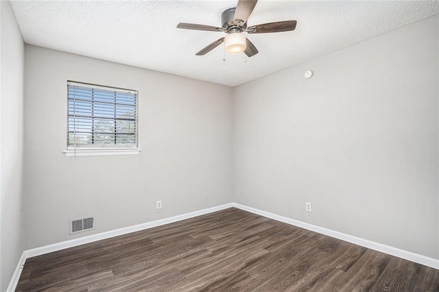 6354 Shannon Pkwy Unit 30C, Union City, GA 30291 - spare room with dark wood finished floors, baseboards, a ceiling fan, and a textured ceiling