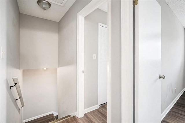6354 Shannon Pkwy Unit 30C, Union City, GA 30291 - corridor featuring a textured ceiling, wood finished floors, and baseboards