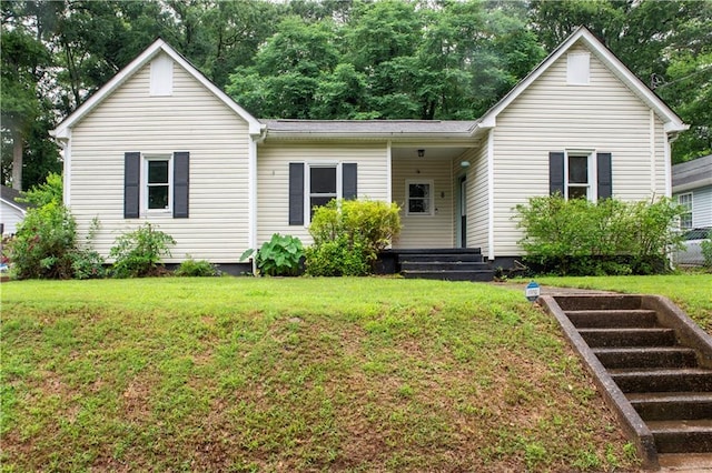 single story home with a front yard