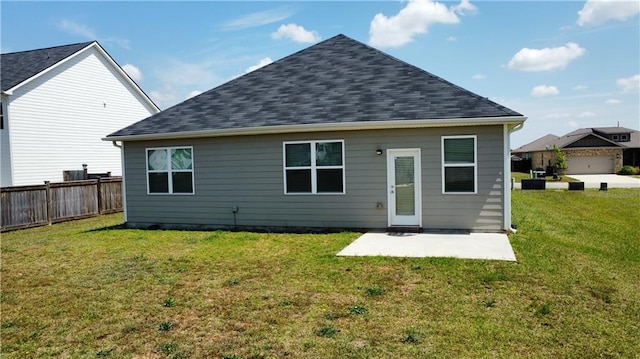 215 Barnyard Way, Perry, GA 31069 - rear view of house featuring a patio area and roof with shingles