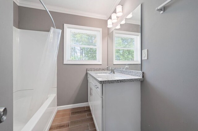 4284 Carlos Ct, Powder Springs, GA 30127 - bathroom with shower / bath combination with curtain, crown molding, vanity, wood tiled floor, and baseboards