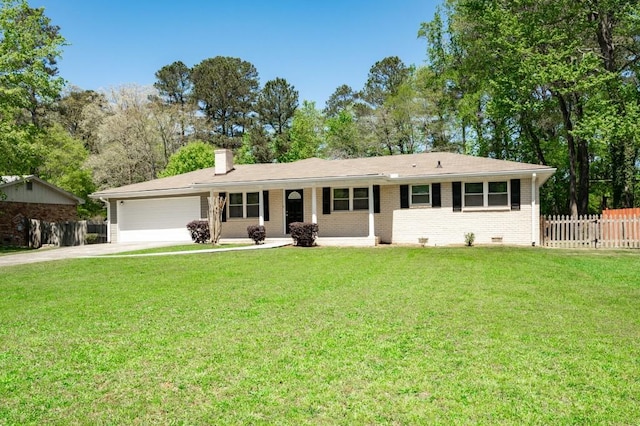 4284 Carlos Ct, Powder Springs, GA 30127 - single story home with a front yard, an attached garage, fence, and driveway