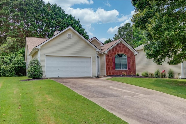 965 Under Ct, Sugar Hill, GA 30518 - ranch-style home featuring a garage, concrete driveway, a front yard, and brick siding