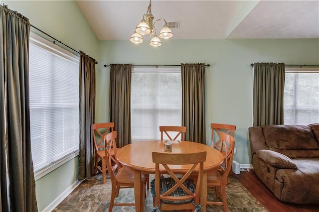965 Under Ct, Sugar Hill, GA 30518 - dining room with baseboards, a chandelier, and stone finish flooring