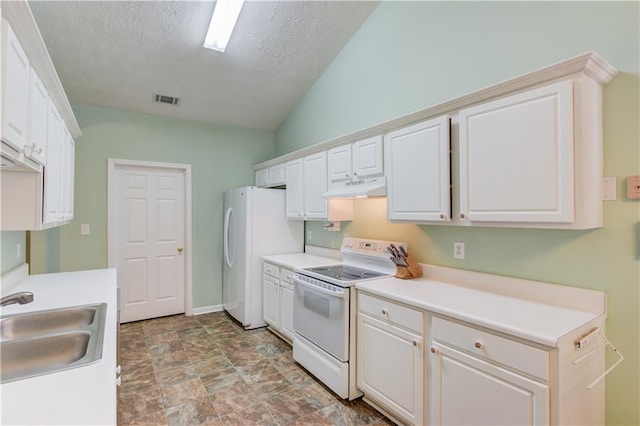 965 Under Ct, Sugar Hill, GA 30518 - kitchen featuring white appliances, under cabinet range hood, a sink, a textured ceiling, and white cabinetry