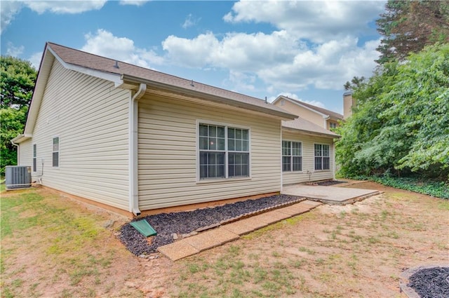 965 Under Ct, Sugar Hill, GA 30518 - back of house with central air condition unit and a patio