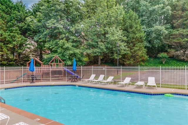 965 Under Ct, Sugar Hill, GA 30518 - community pool featuring view of wooded area