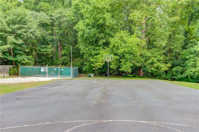 965 Under Ct, Sugar Hill, GA 30518 - view of sport court with community basketball court and a forest view