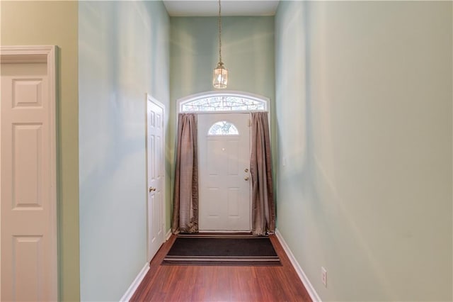 965 Under Ct, Sugar Hill, GA 30518 - doorway featuring dark wood-style floors and baseboards