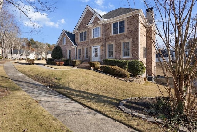 view of front of home featuring a front lawn